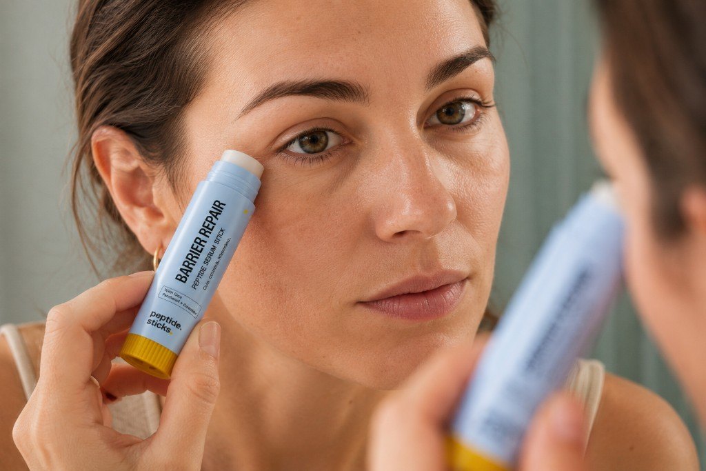 Barrier Repair Peptide Stick applied near the under eye and cheek area